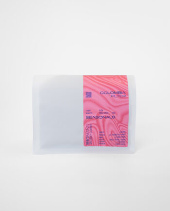 Seasonal Filter aus Kolumbien in weißer Packung mit pinker Banderole